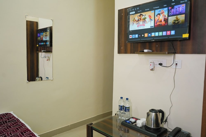 Imagen de la habitación del Hotel Adarsh, Patna. Foto 12