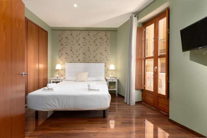 Imagen de la habitación del Hotel Adarve Flats. Foto 18