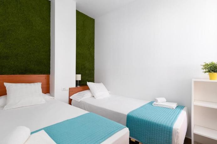 Imagen de la habitación del Hotel Adarve Flats. Foto 19