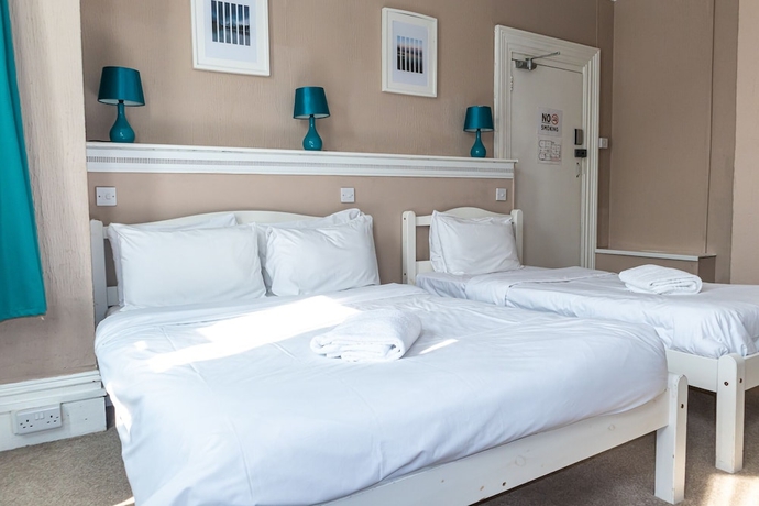 Imagen de la habitación del Hotel Addenro Serviced Rooms. Foto 2