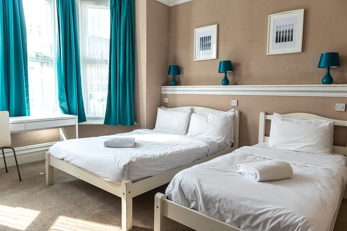 Imagen de la habitación del Hotel Addenro Serviced Rooms. Foto 3