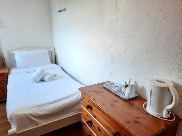 Imagen de la habitación del Hotel Addenro Serviced Rooms. Foto 4