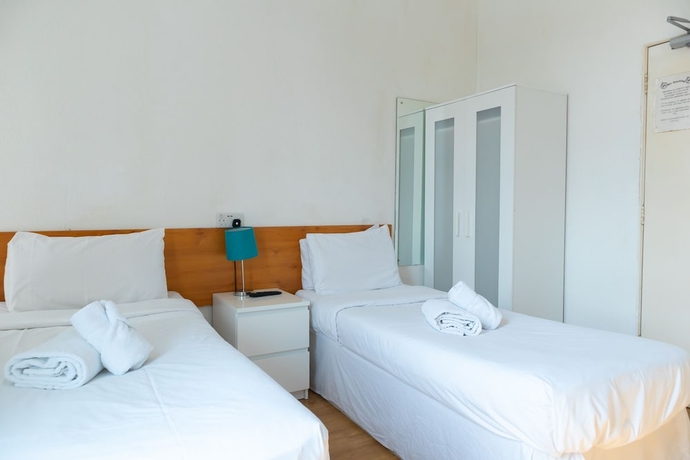 Imagen de la habitación del Hotel Addenro Serviced Rooms. Foto 6