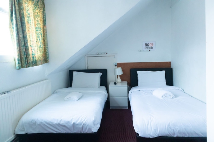 Imagen de la habitación del Hotel Addenro Serviced Rooms. Foto 7