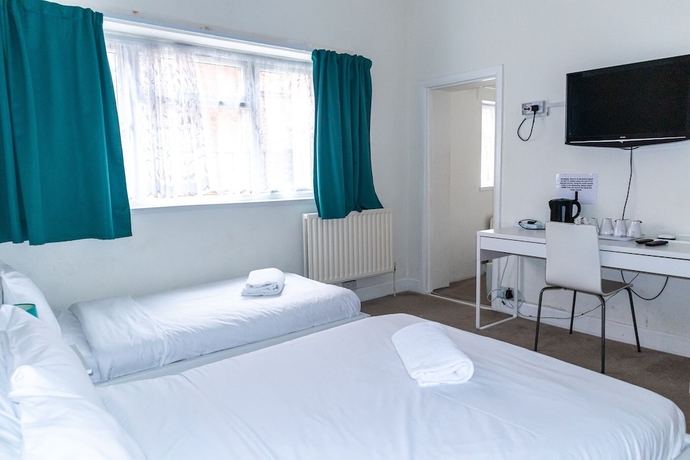 Imagen de la habitación del Hotel Addenro Serviced Rooms. Foto 10