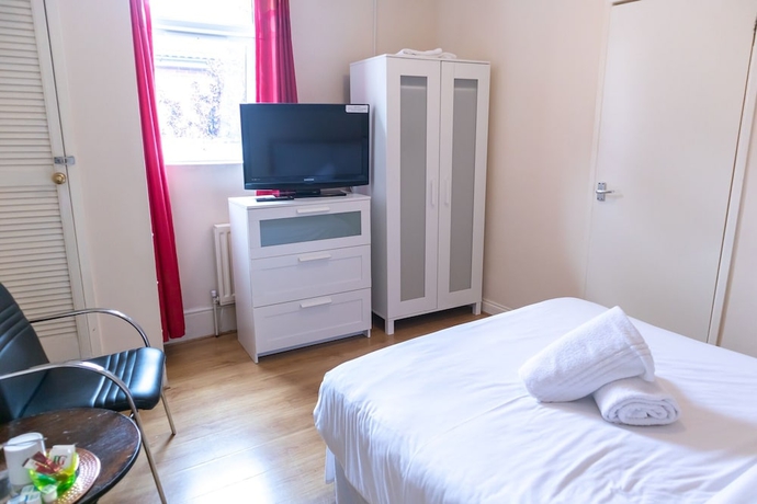 Imagen de la habitación del Hotel Addenro Serviced Rooms. Foto 14