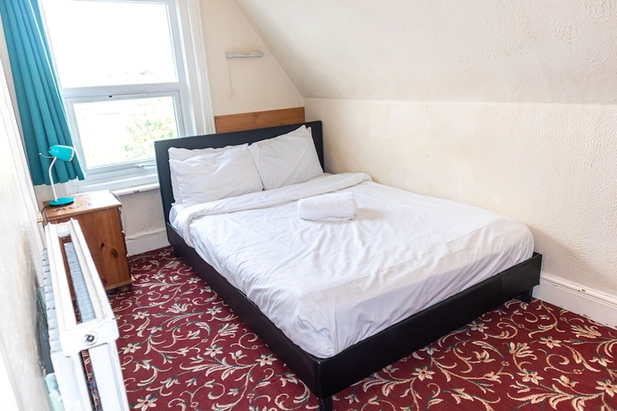 Imagen de la habitación del Hotel Addenro Serviced Rooms. Foto 16