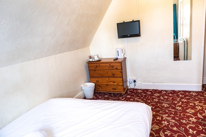Imagen de la habitación del Hotel Addenro Serviced Rooms. Foto 17