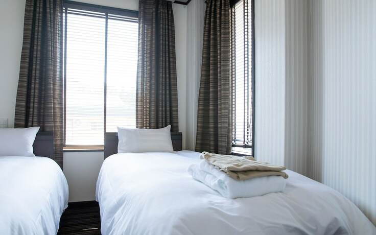 Imagen de la habitación del Hotel Address Nagasaka. Foto 13