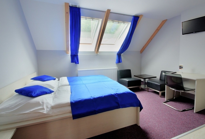 Imagen de la habitación del Hotel Adeba. Foto 12