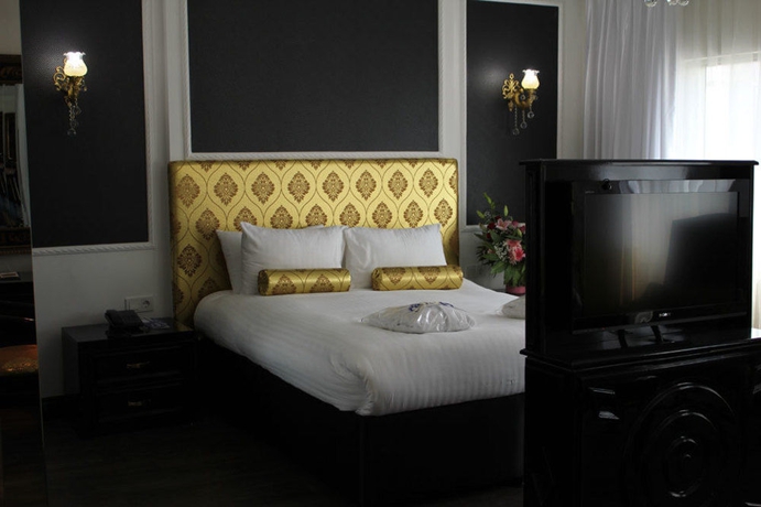 Imagen de la habitación del Hotel Adela Hotel. Foto 10