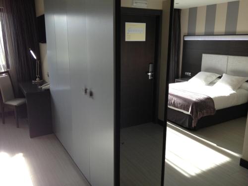 Imagen de la habitación del Hotel Adelma. Foto 7