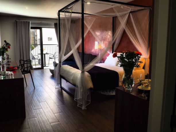 Imagen de la habitación del Hotel Adelphi Boutique. Foto 2