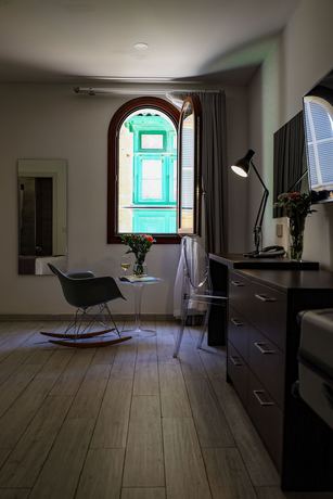 Imagen de la habitación del Hotel Adelphi Boutique. Foto 10
