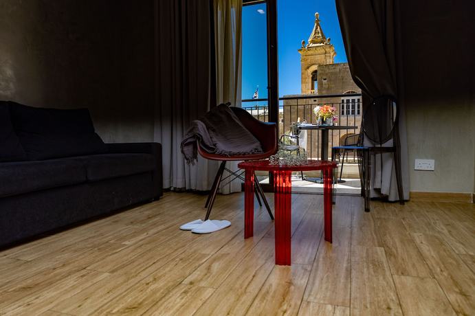 Imagen de la habitación del Hotel Adelphi Boutique. Foto 17
