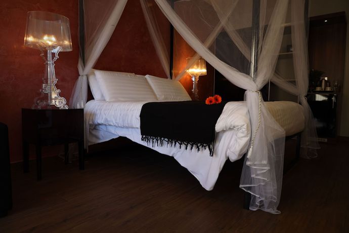Imagen de la habitación del Hotel Adelphi Boutique. Foto 19