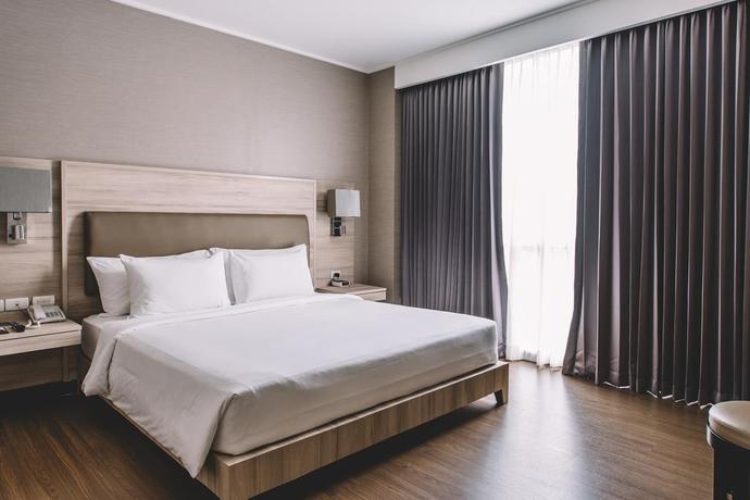 Imagen de la habitación del Hotel Adelphi Suites Bangkok. Foto 4