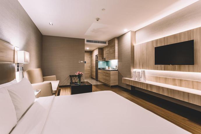 Imagen de la habitación del Hotel Adelphi Suites Bangkok. Foto 5