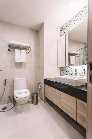 Imagen de la habitación del Hotel Adelphi Suites Bangkok. Foto 6