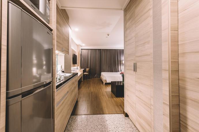 Imagen de la habitación del Hotel Adelphi Suites Bangkok. Foto 7