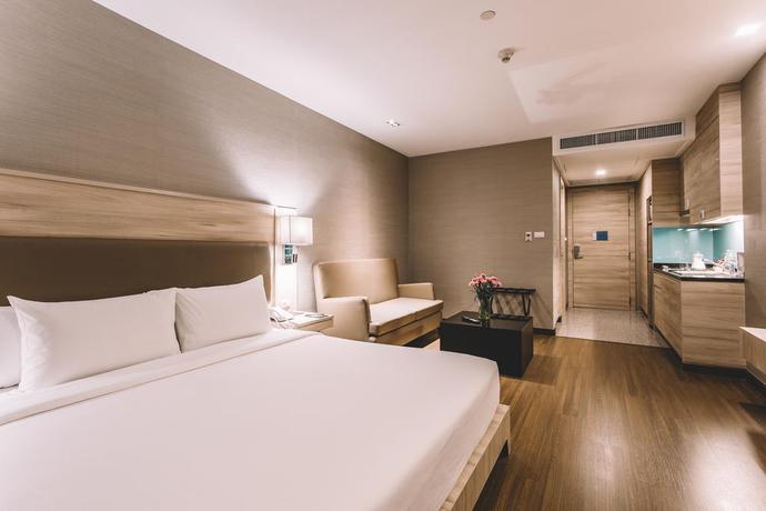 Imagen de la habitación del Hotel Adelphi Suites Bangkok. Foto 8
