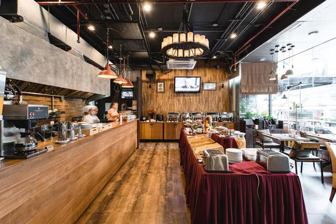 Imagen del bar/restaurante del Hotel Adelphi Suites Bangkok. Foto 3