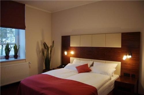 Imagen de la habitación del Hotel Adena. Foto 9