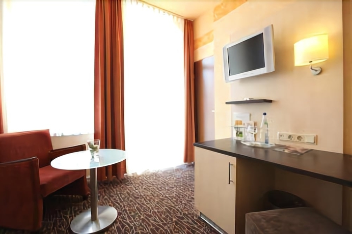 Imagen de la habitación del Hotel Adesso. Foto 12