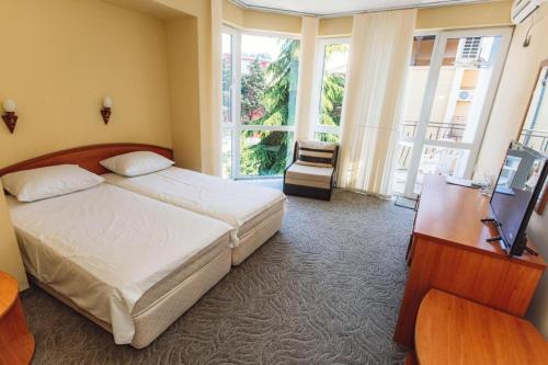 Imagen de la habitación del Hotel Adeti Residence. Foto 19