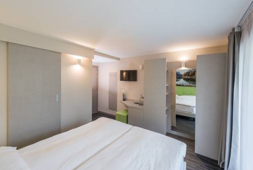 Imagen de la habitación del Hotel Adhhoc. Foto 9