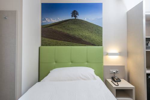 Imagen de la habitación del Hotel Adhhoc. Foto 11