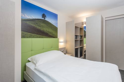 Imagen de la habitación del Hotel Adhhoc. Foto 12