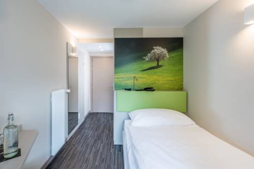 Imagen de la habitación del Hotel Adhhoc. Foto 13