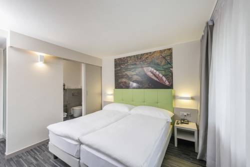 Imagen de la habitación del Hotel Adhhoc. Foto 15