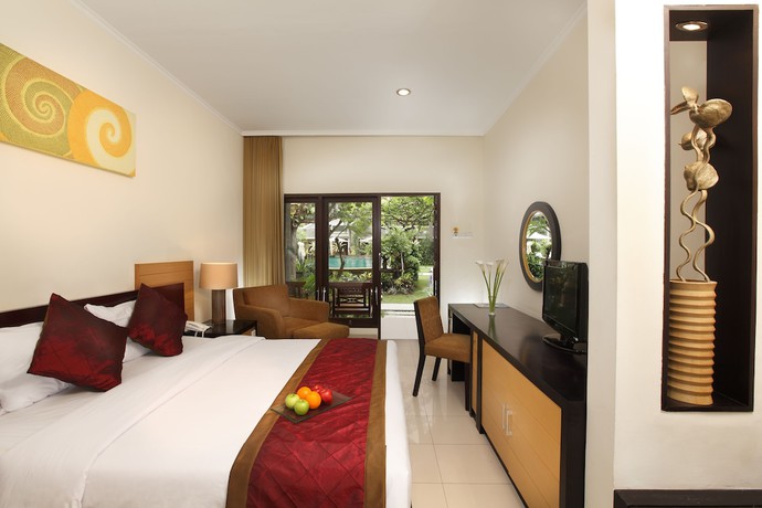 Imagen de la habitación del Hotel Adhi Jaya. Foto 13