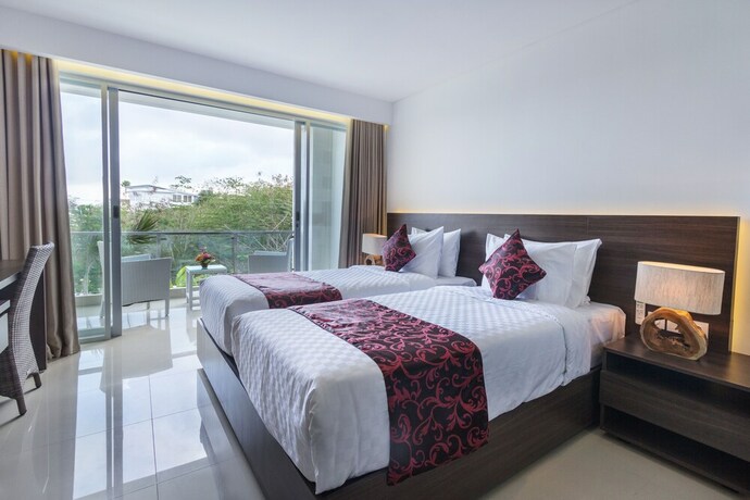 Imagen de la habitación del Hotel Adhiloka. Foto 16