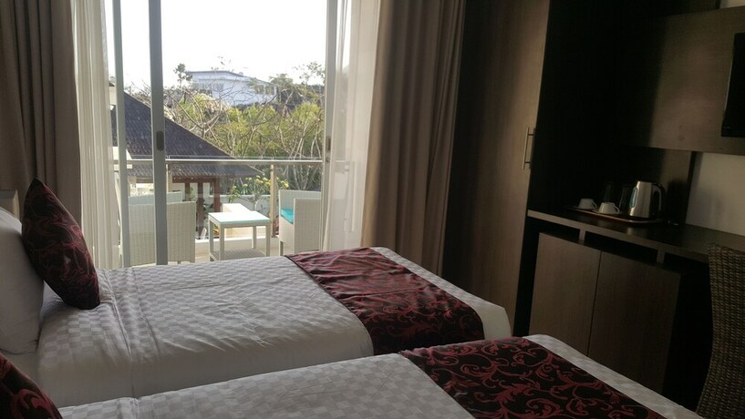 Imagen de la habitación del Hotel Adhiloka. Foto 27
