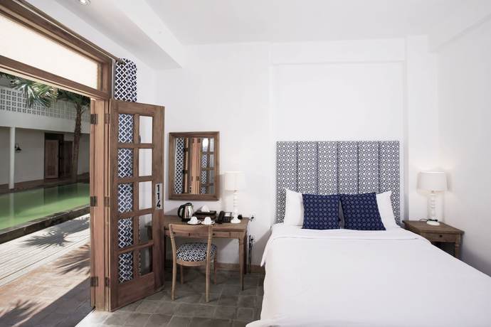 Imagen de la habitación del Hotel Adhisthana Hotel. Foto 4