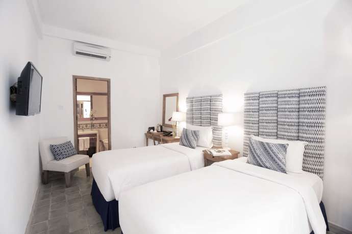 Imagen de la habitación del Hotel Adhisthana Hotel. Foto 8