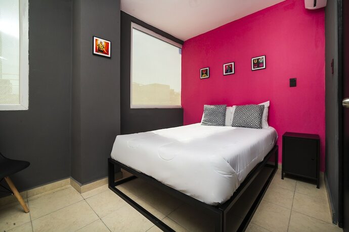 Imagen de la habitación del Hotel Adhoc Cintermex. Foto 14