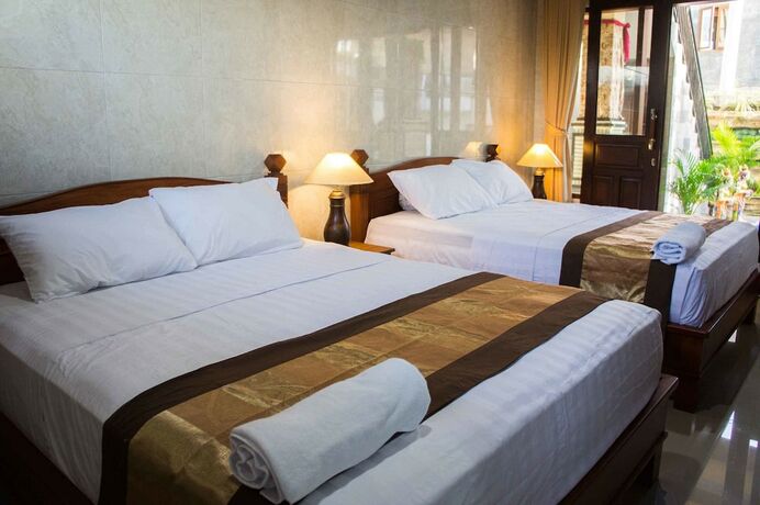 Imagen de la habitación del Hotel Adi Homestay Canggu. Foto 20