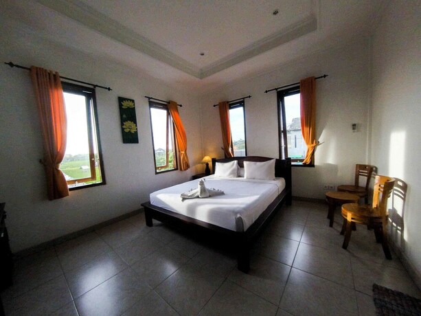 Imagen de la habitación del Hotel Adi Homestay Canggu. Foto 24