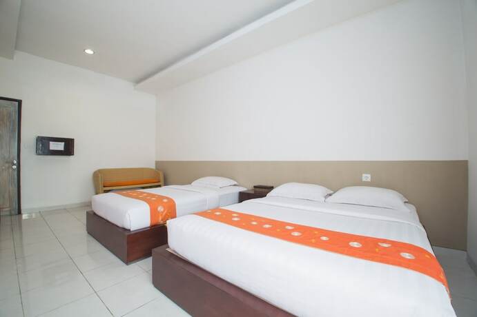 Imagen de la habitación del Hotel Adikara Renon. Foto 19