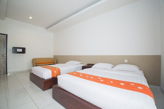 Imagen de la habitación del Hotel Adikara Renon. Foto 21
