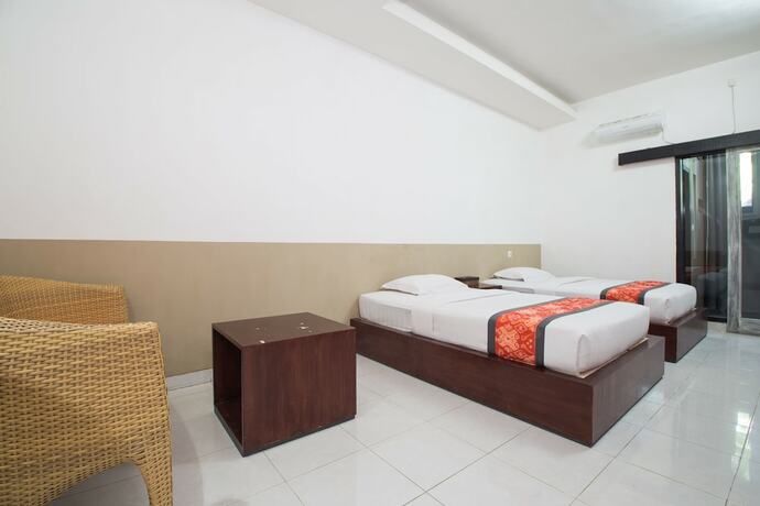 Imagen de la habitación del Hotel Adikara Renon. Foto 23