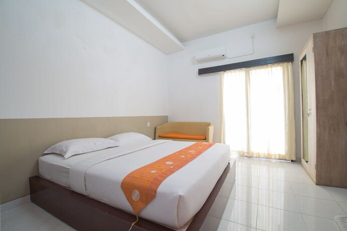 Imagen de la habitación del Hotel Adikara Renon. Foto 27