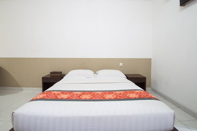 Imagen de la habitación del Hotel Adikara Renon. Foto 28