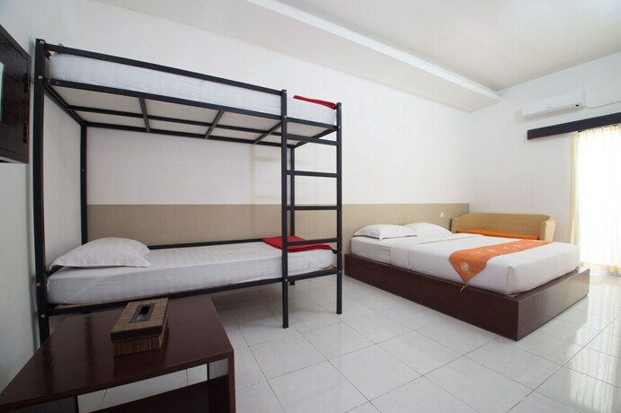 Imagen de la habitación del Hotel Adikara Renon. Foto 32
