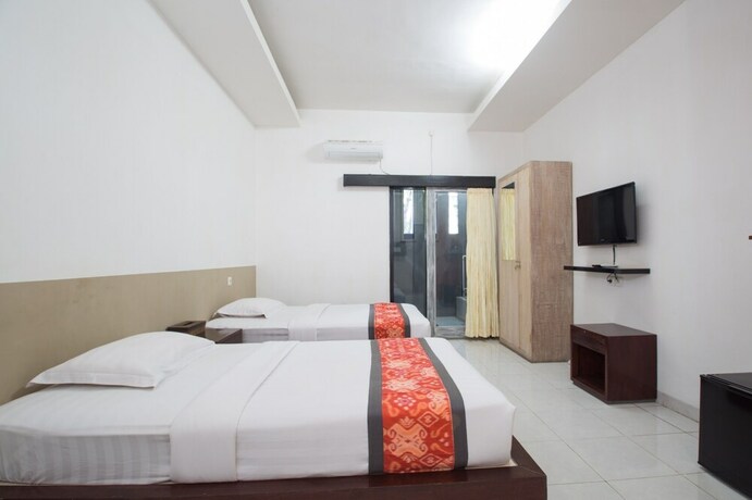 Imagen de la habitación del Hotel Adikara Renon. Foto 33