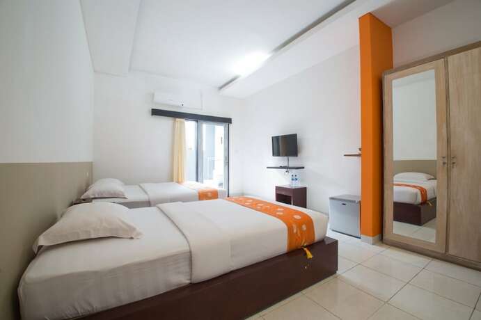 Imagen de la habitación del Hotel Adikara Renon. Foto 34